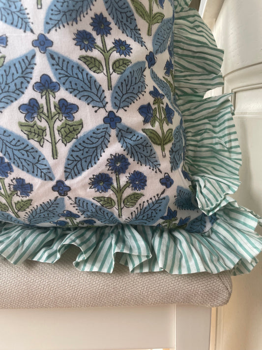 Handprinted blue and green floral cushion with striped frill