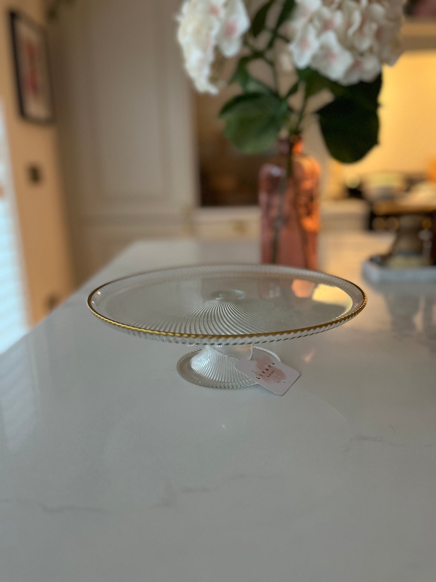 Gold rimmed ribbed glass cake stand