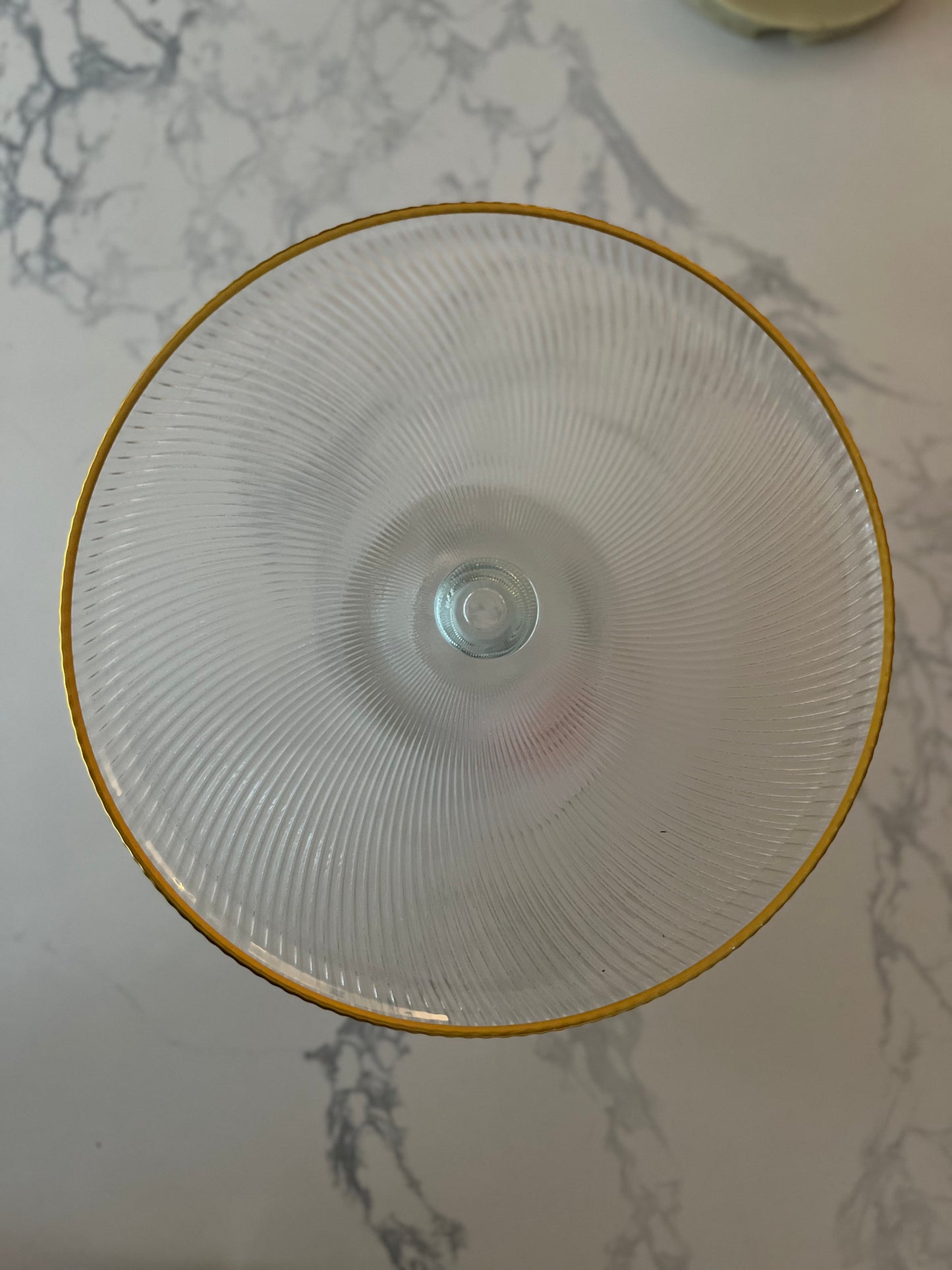 Gold rimmed ribbed glass cake stand